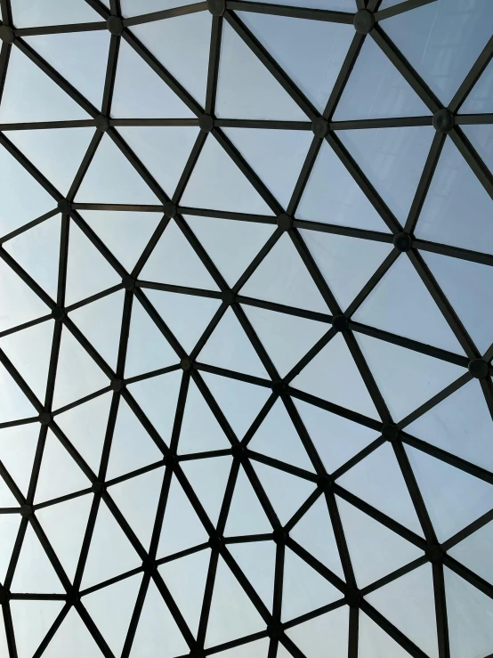 an ornate ceiling with metal design inside a building