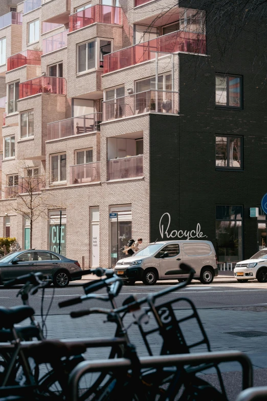 several bicycles are parked in front of a building