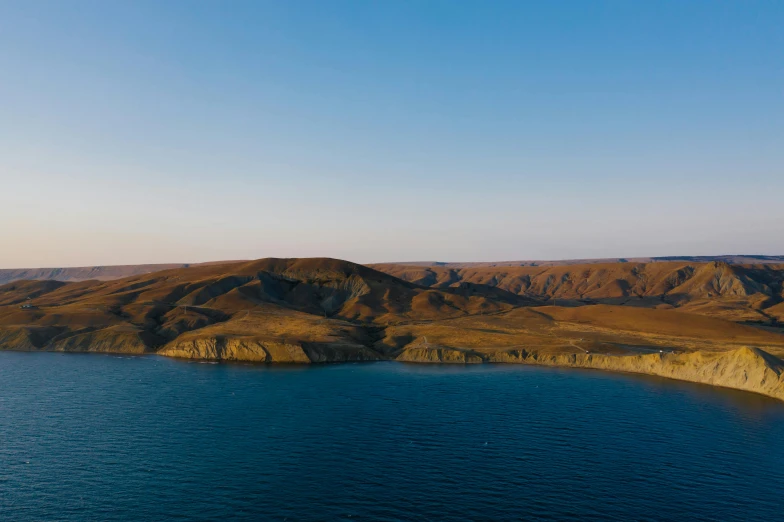 a mountain and lake in the middle of nowhere