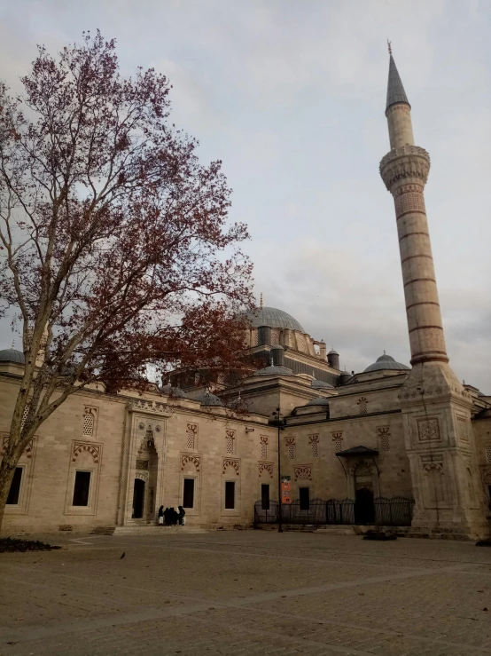 a large white building with a tall tall tower