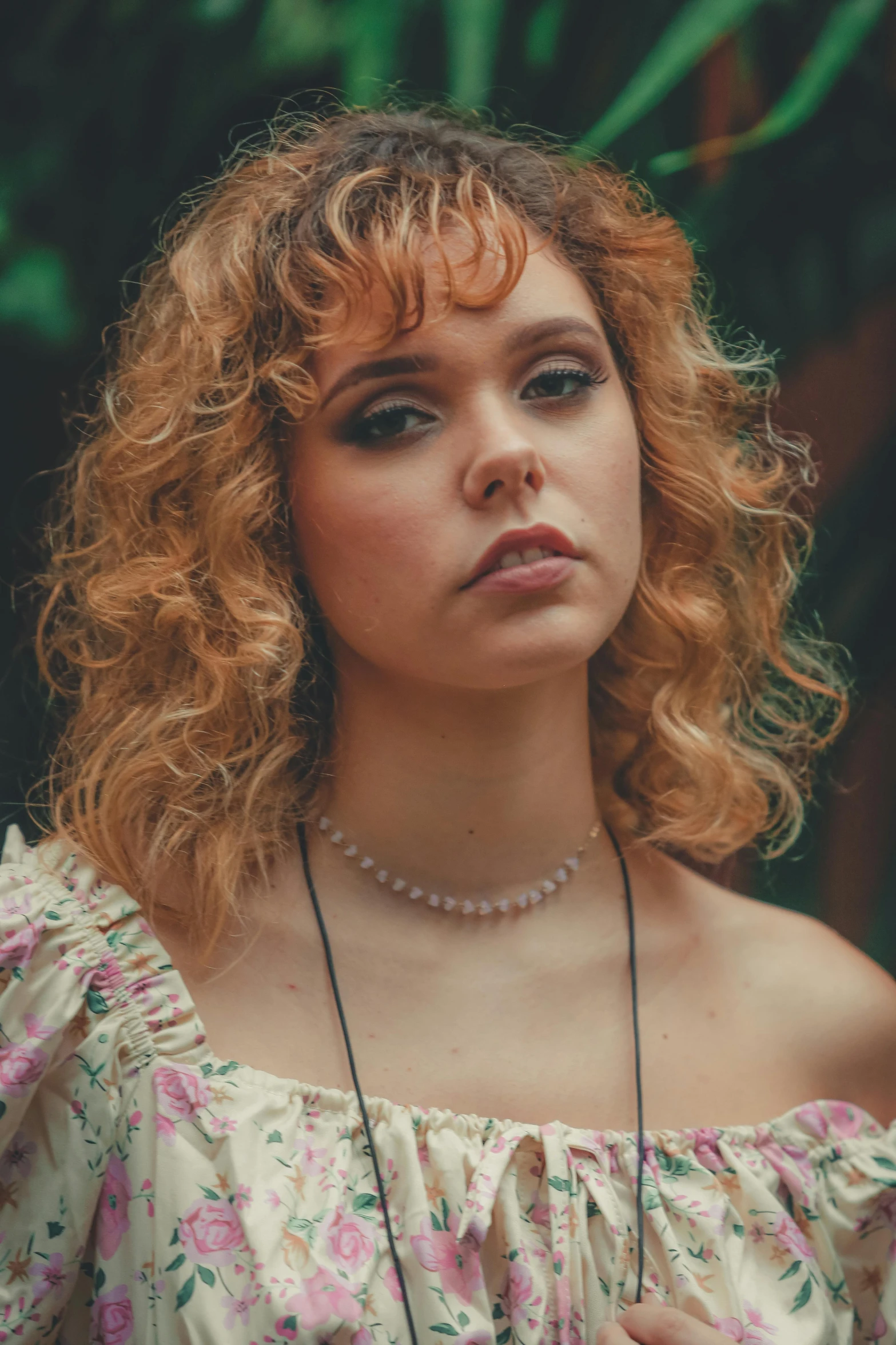 the woman is posing with red hair