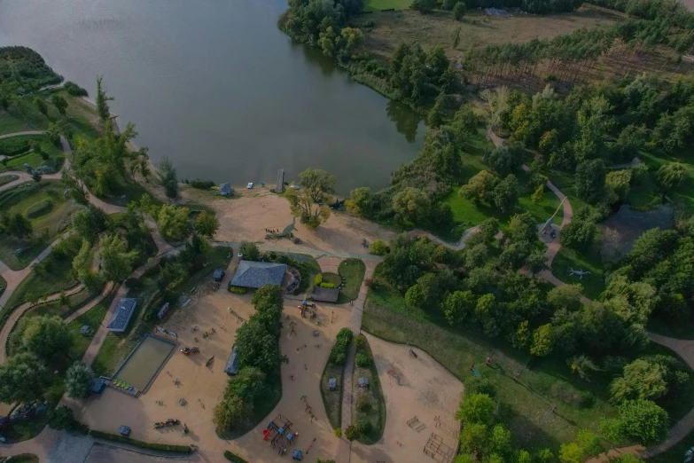 an aerial view of the park and surrounding water