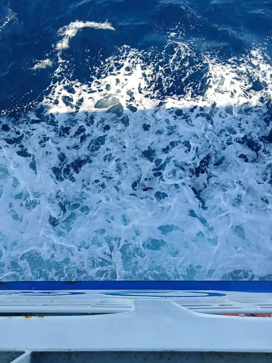 blue ocean waves on the surface of water