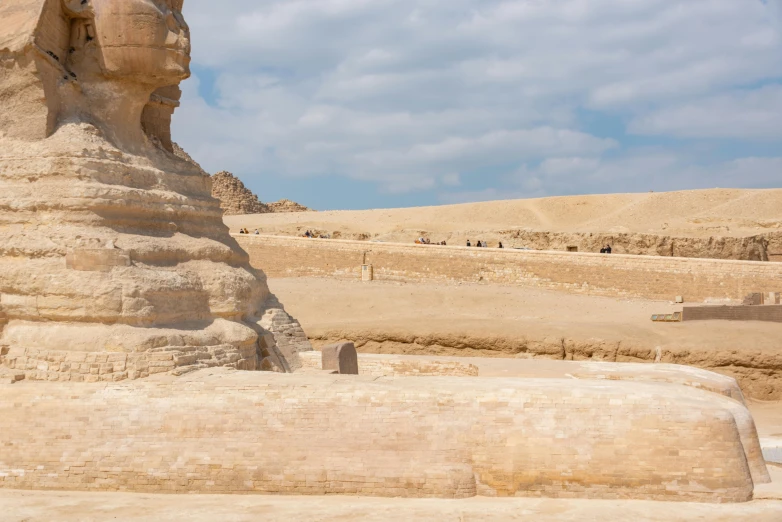 the large head of an ancient man with a large hat