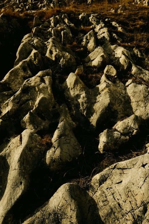 large rocks piled on top of each other in a field