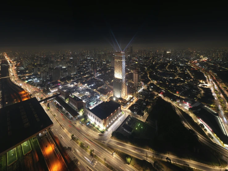 night time aerial view of a city and freeway