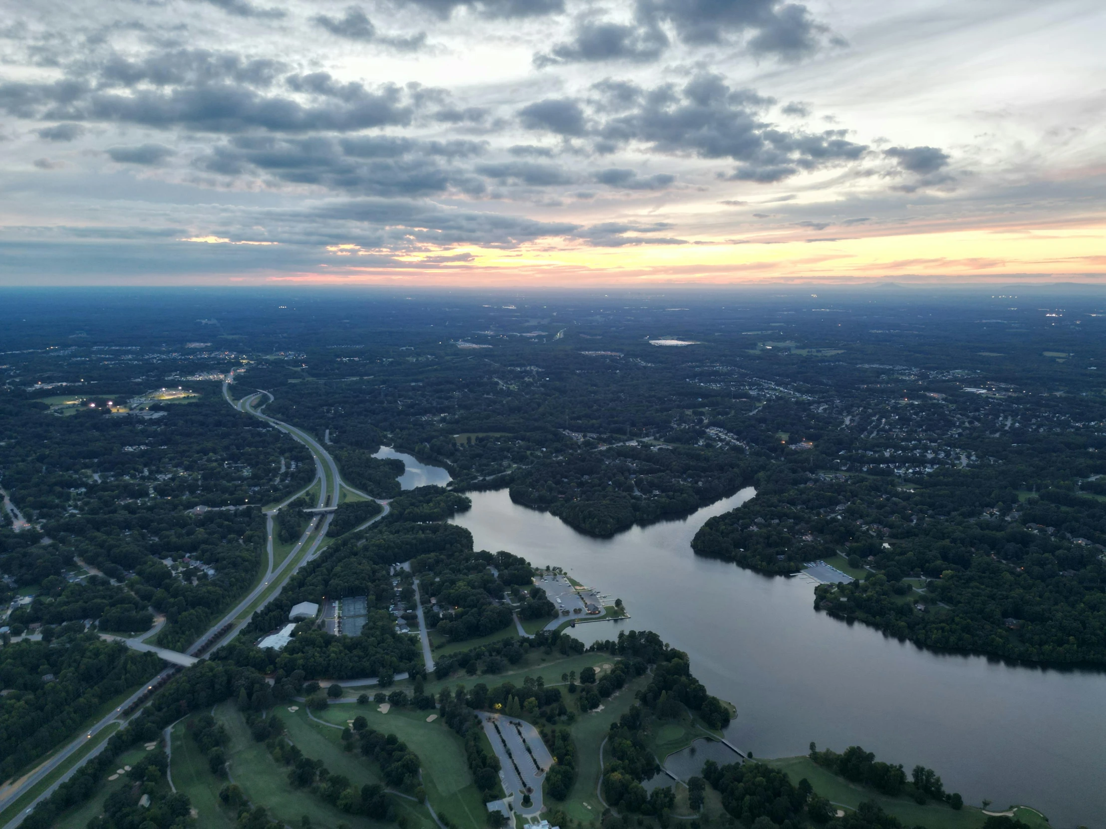 a picture of the view from a plane during sunset