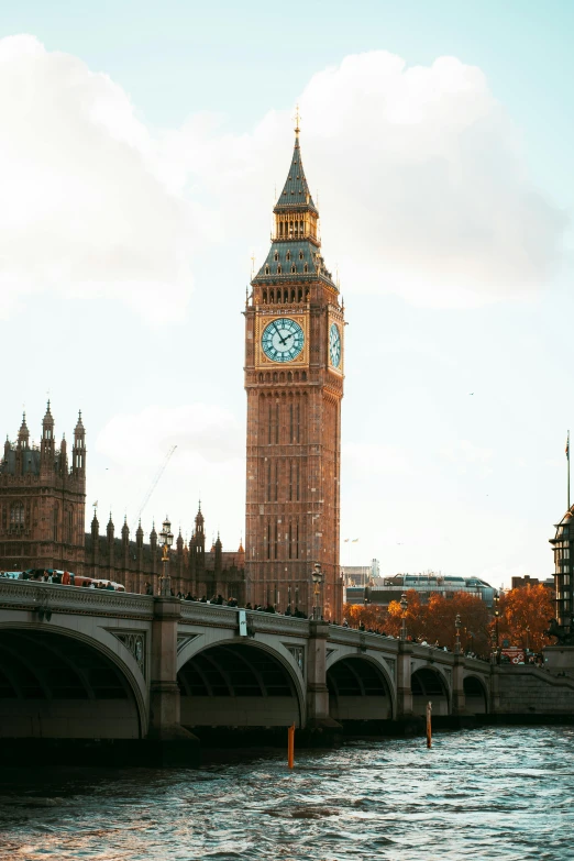 big ben towering over the city of london as it's viewed