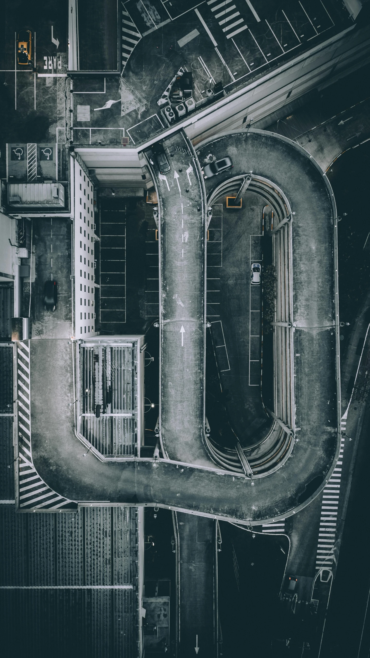 an aerial view of street intersection on a busy city