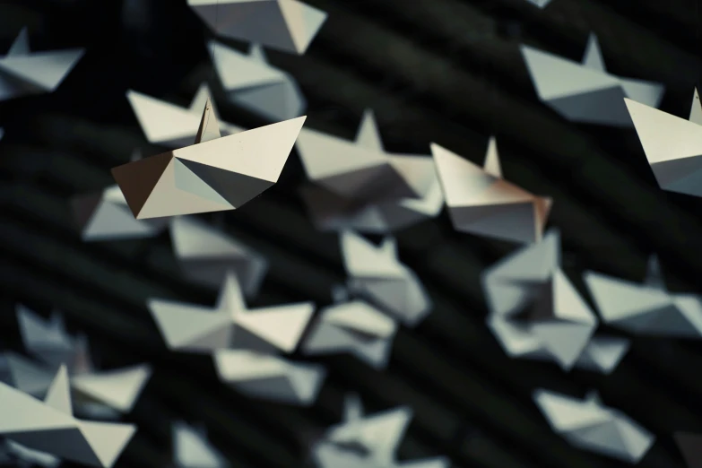 many origami stars, all in different shapes and sizes