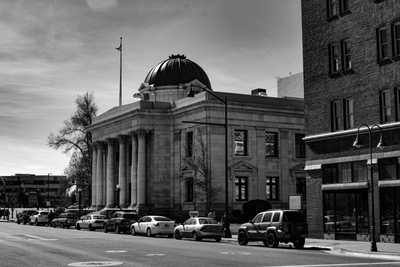 a black and white po of a large building with a dome on top