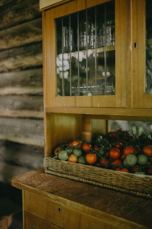 a wooden hut with a few glass door windows on top