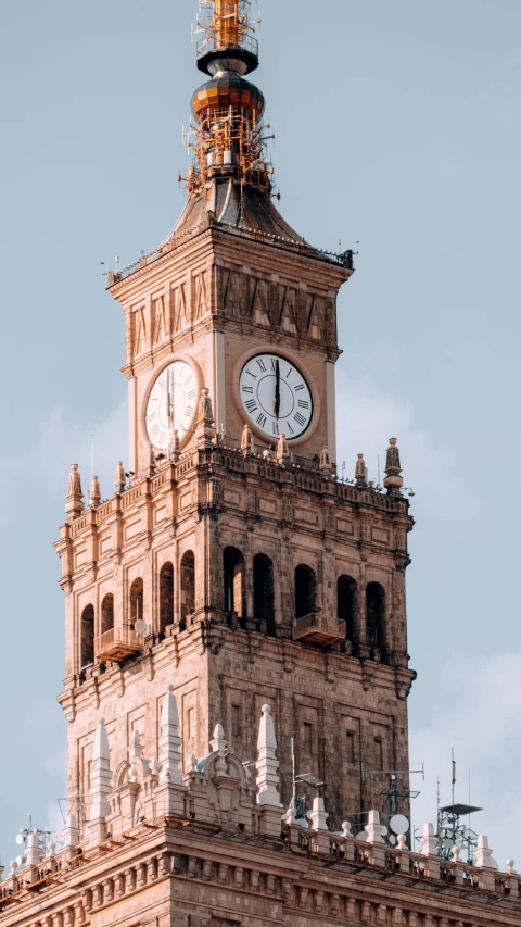 a clock tower with a sky background