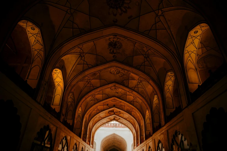 a view of an old cathedral with lights inside