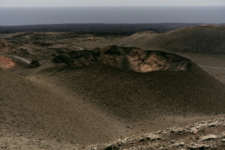 an uphill view of some very large hills