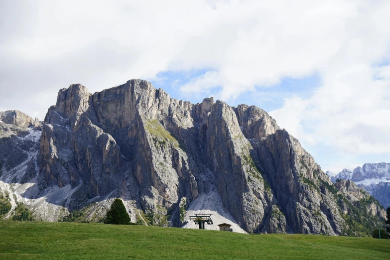 there are some large rocks near the mountains