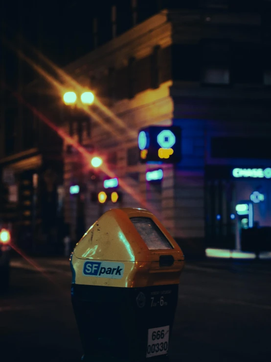 a pograph of a parking meter on a busy city street