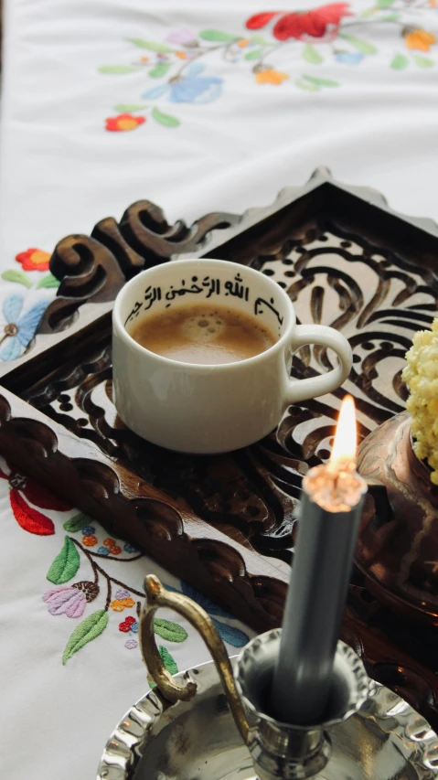 there is food and coffee sitting on a tray