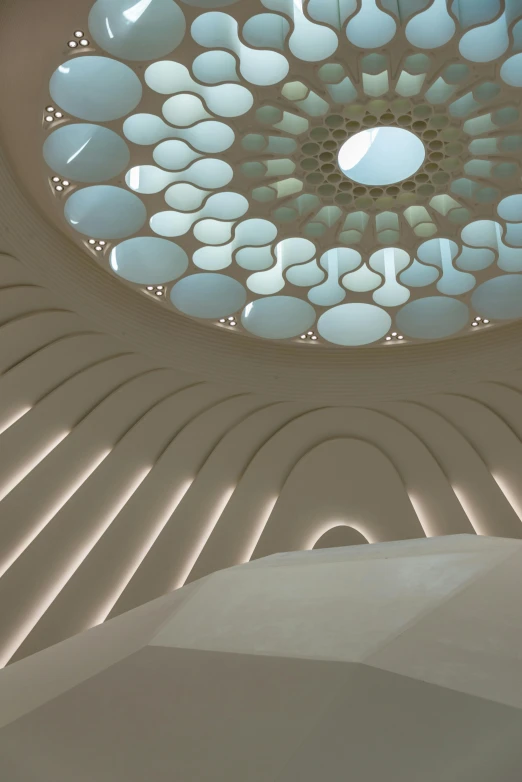 a round dome in a building with white walls