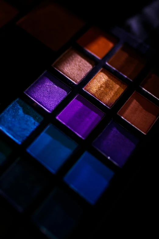 a multicolored square of multi - colored blocks in the dark