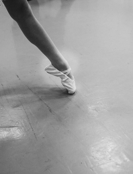 an aerial view of a female ballet dancer