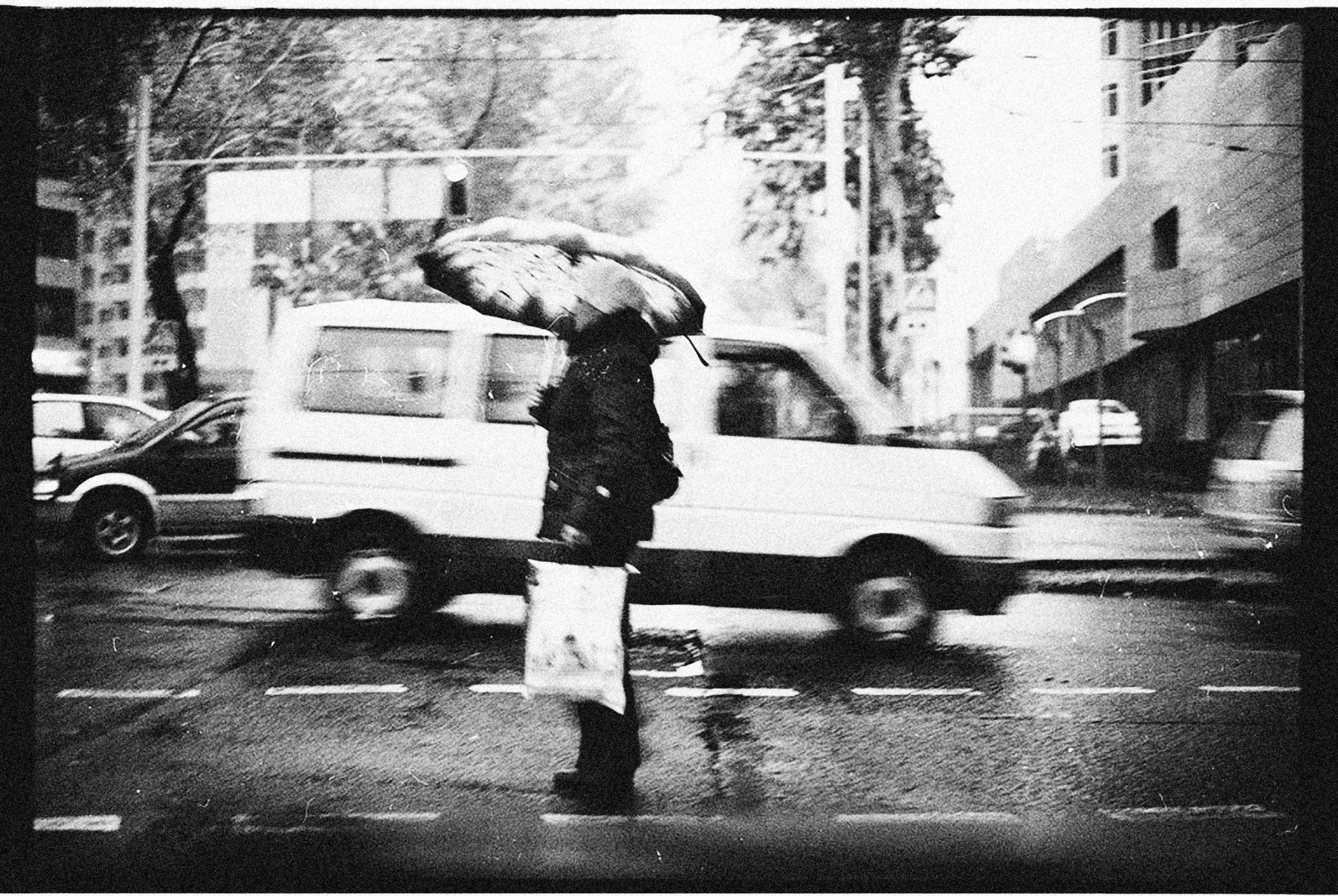 a man is standing on a post outside