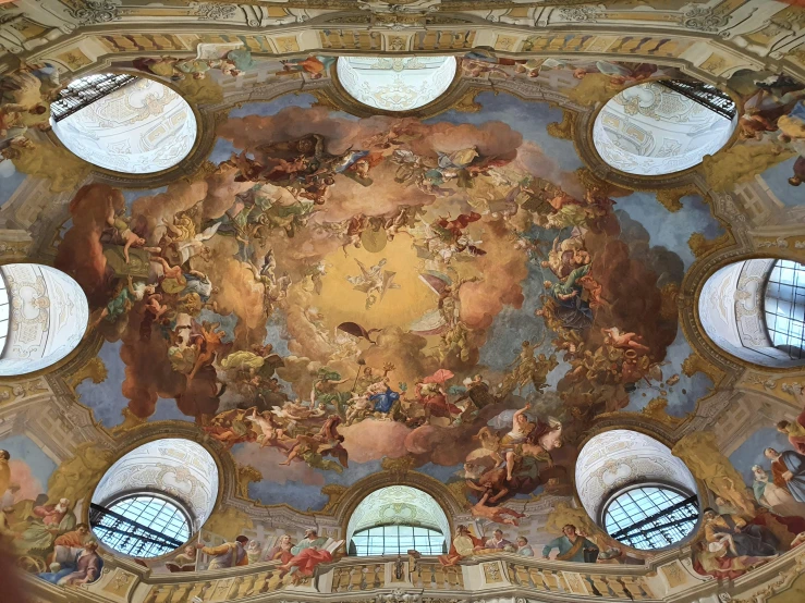 the ceiling painting inside the church is colorful