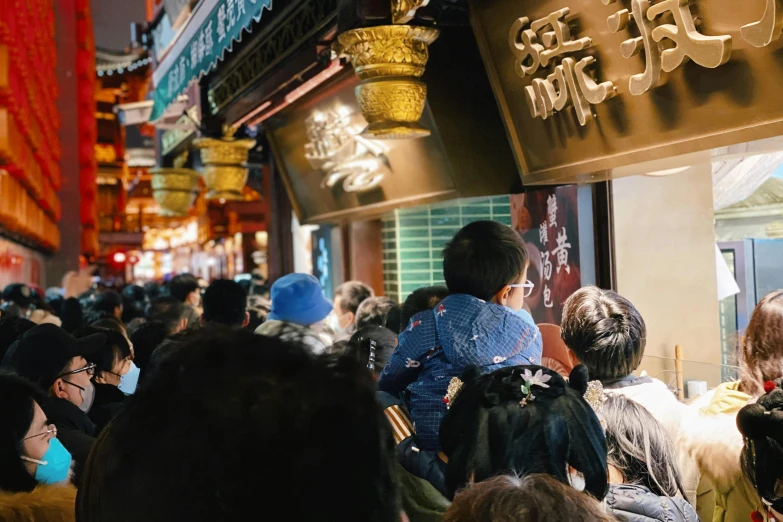 a large group of people on a busy street