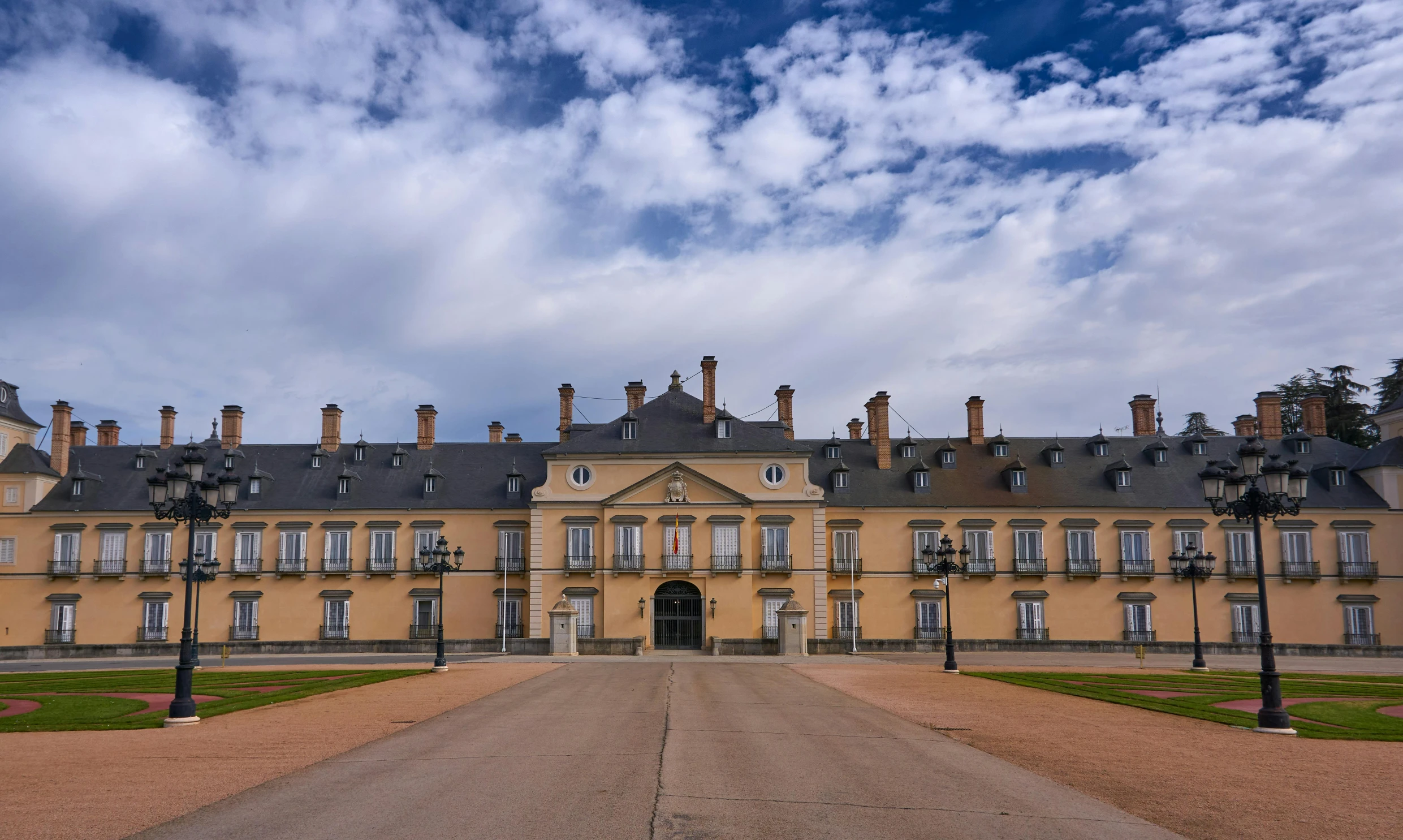 a large building with several trees in front of it