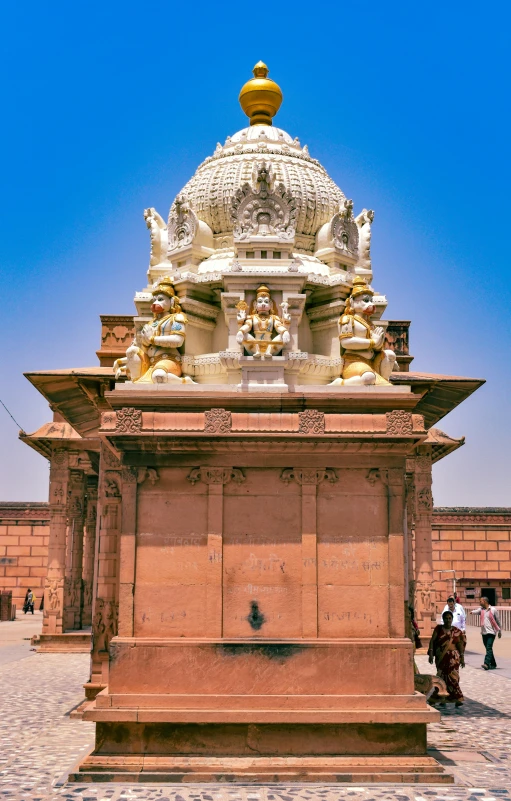 a man that is standing in front of a monument