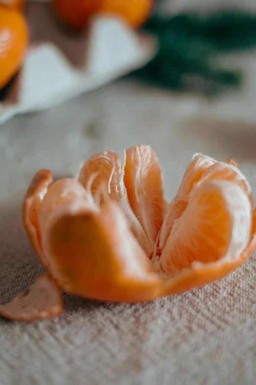 a peeled orange on the table ready for peeling
