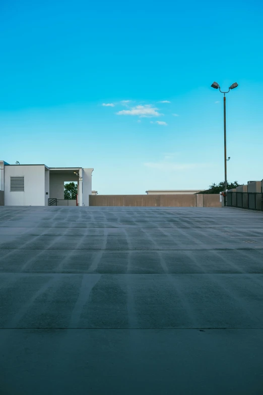 the empty parking lot on top of a building