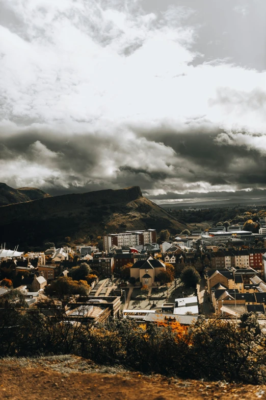 a city under some gray and cloudy skies