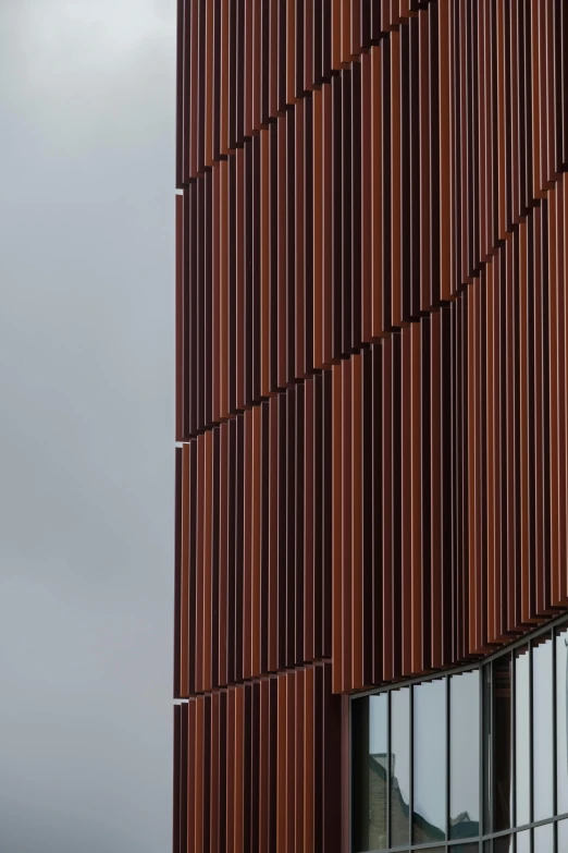 the side of a wooden building on a cloudy day