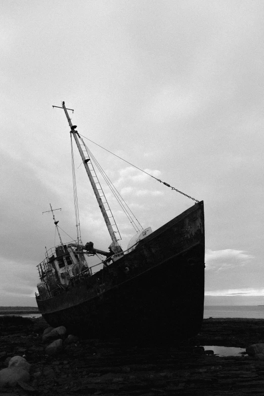 an old fishing boat in the middle of nowhere