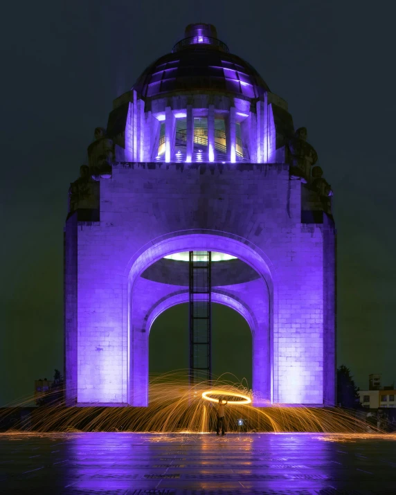 there is light in the arch above and reflecting off of it