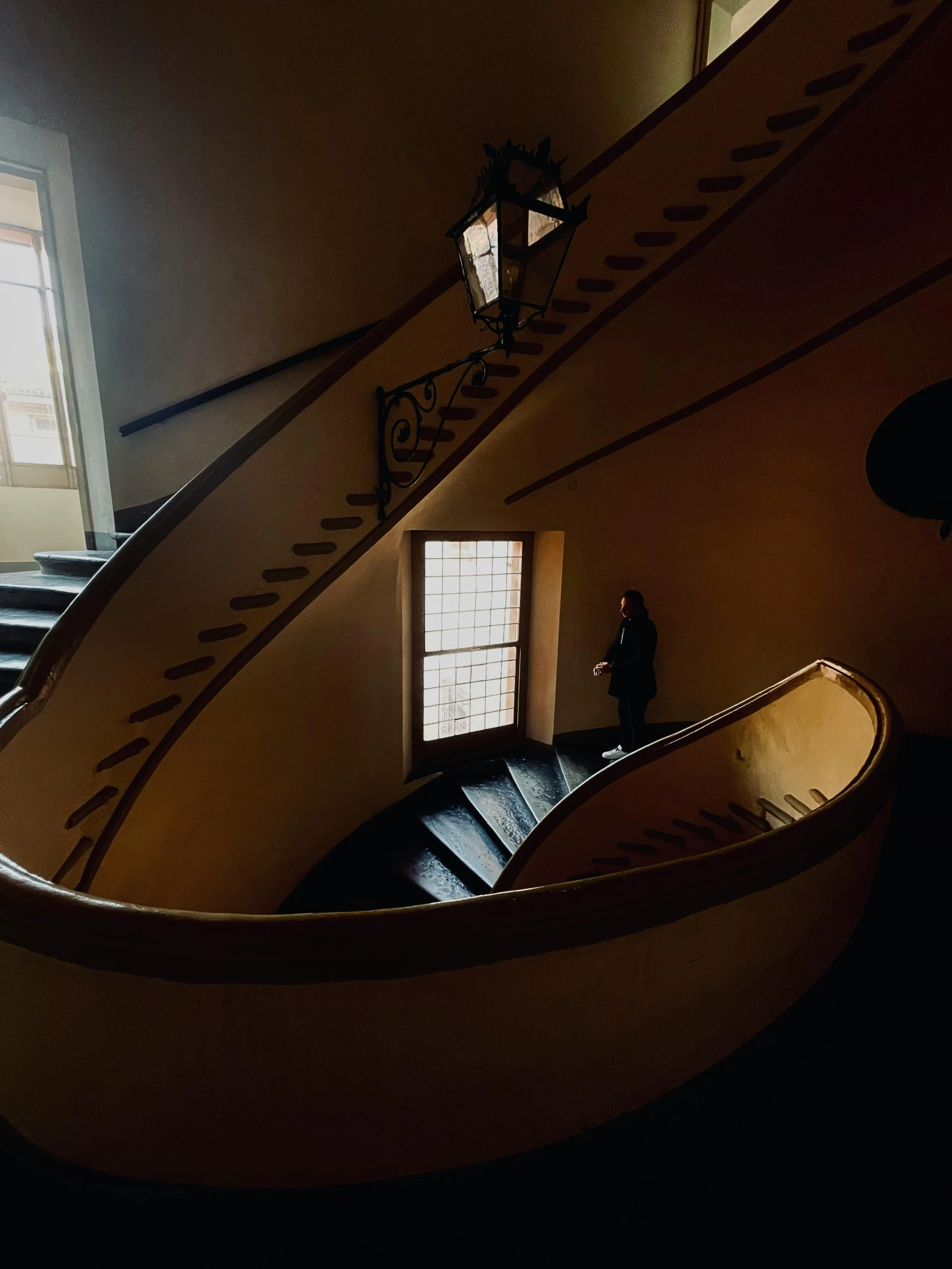 an aerial view of the stairs in a museum