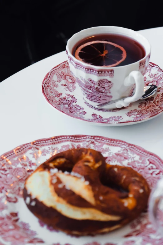 a plate of food and coffee on a table