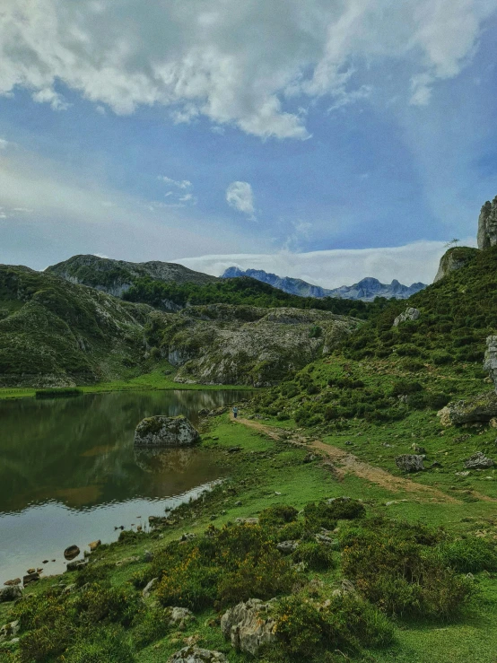 an over head s of a body of water surrounded by mountains