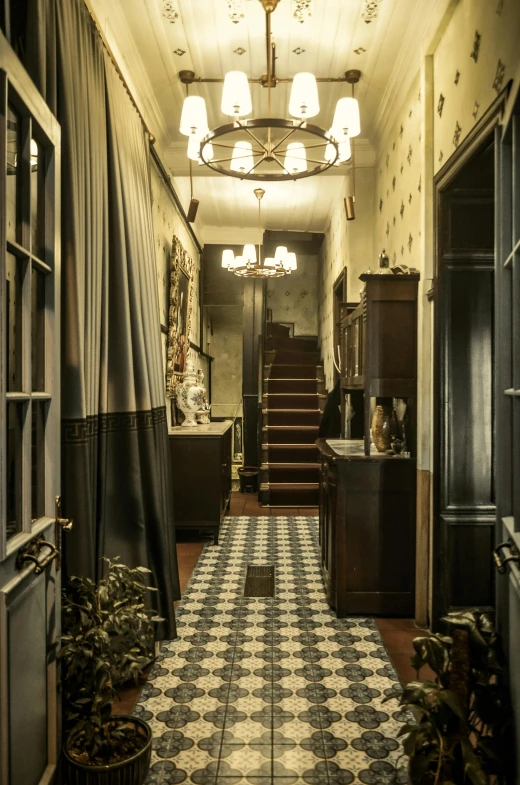 a hallway with various items and lamps in the room