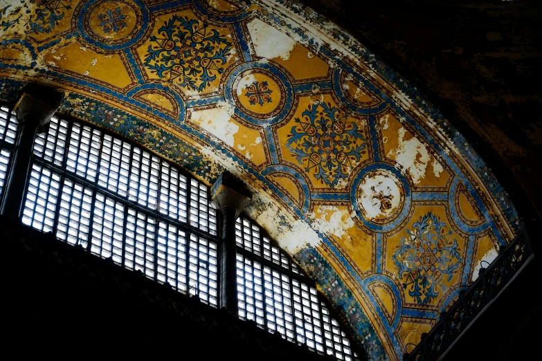 the inside view of a church with decoratively painted ceilings