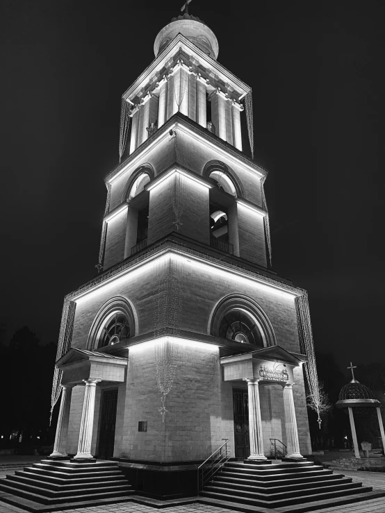 a tall tower with a flag on top