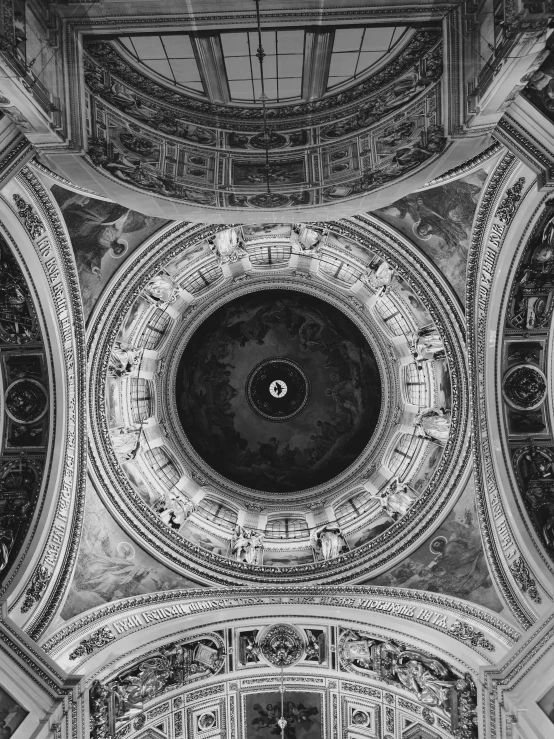 the ceiling in a building with ornate designs