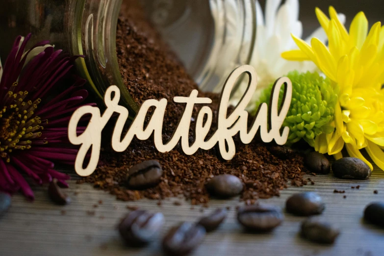 a table topped with grains and flowers on top of it