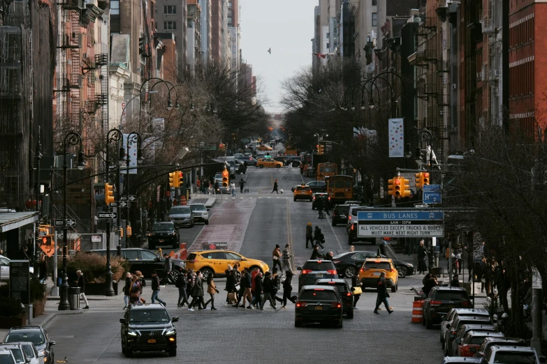 a busy street filled with lots of traffic and people