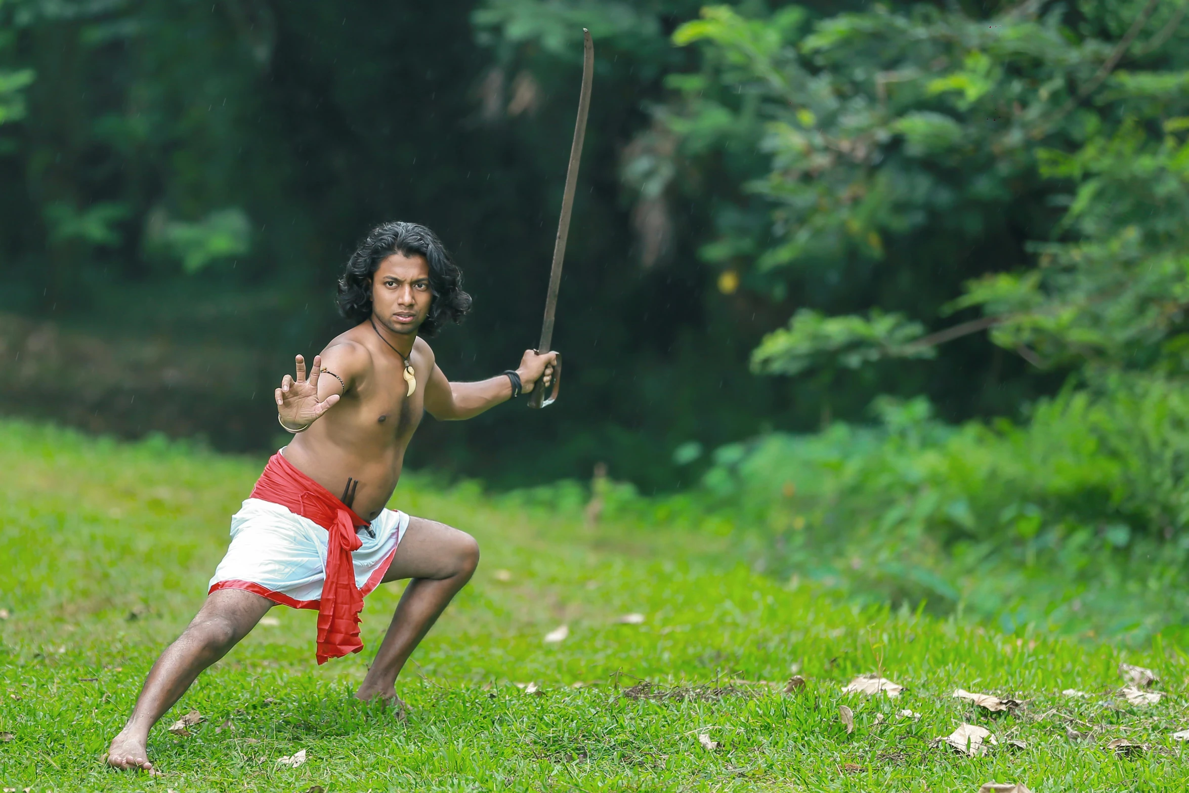 a person that is holding some kind of stick