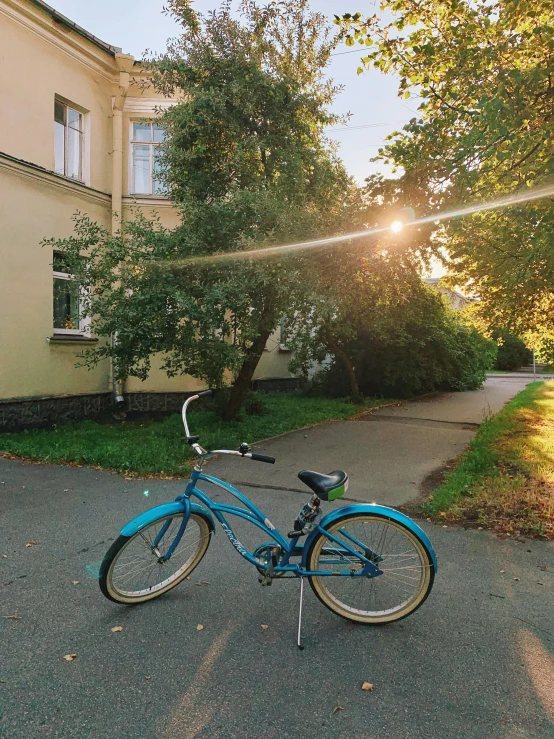 a bicycle sitting in front of an older house