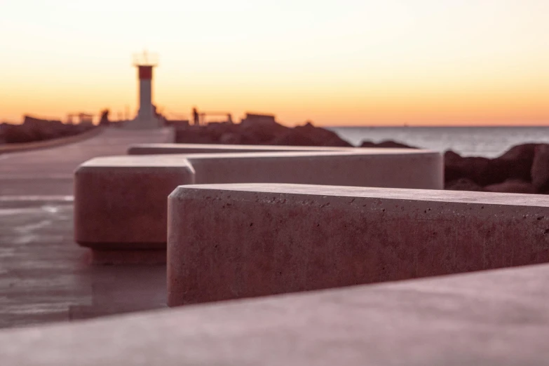 a view of some benches overlooking the ocean