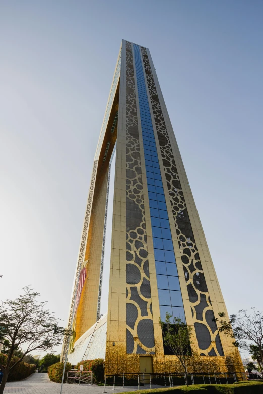 a building with tall towers is shown against a clear sky