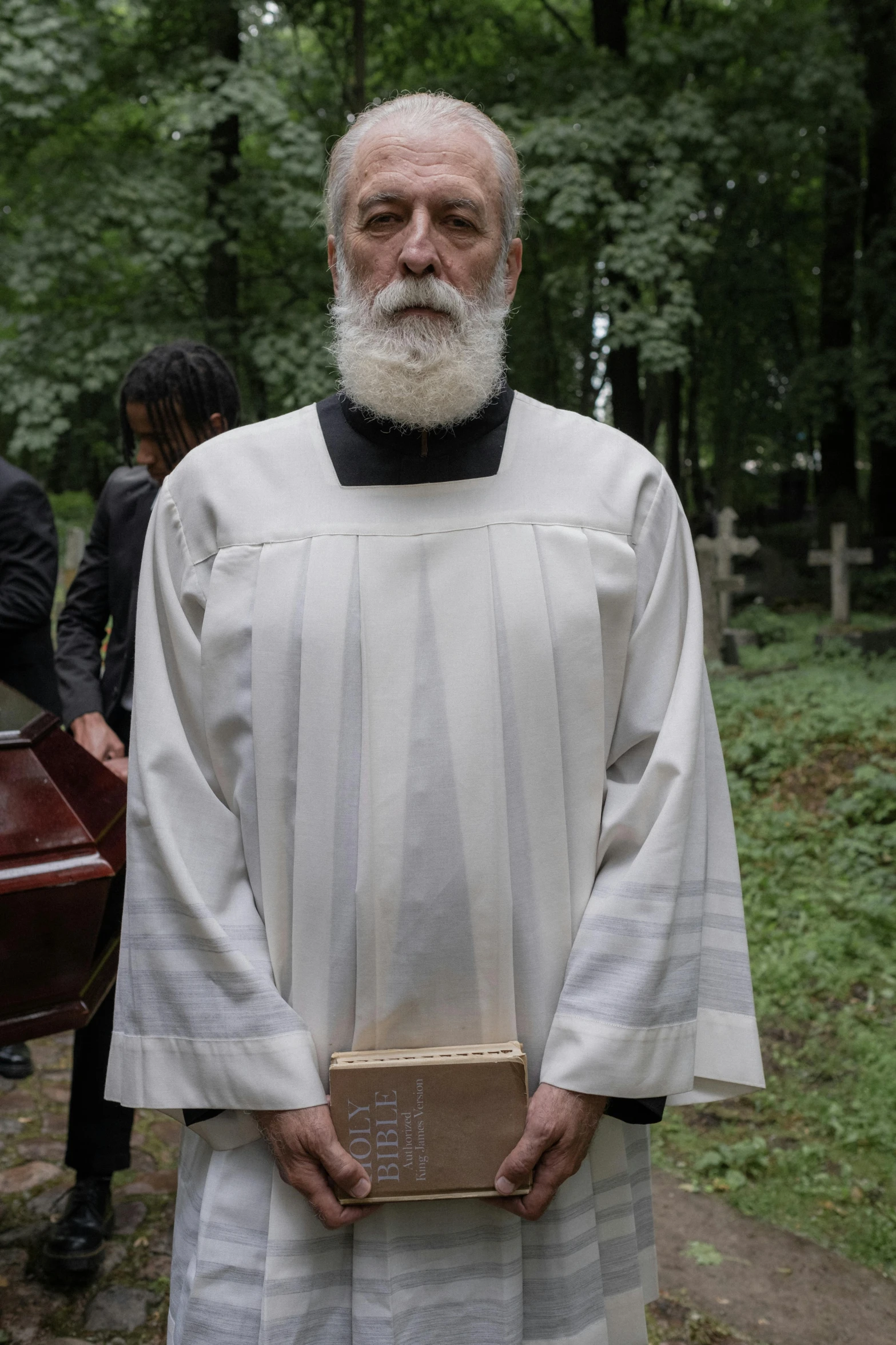 a man holding a box in his hands